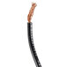 A close-up of a Waring fuse assembly cable with black and copper wires.