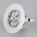 A white plastic disc with a metal rim and a silver blender wheel.