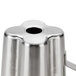 A close up of a stainless steel Waring blender jar.