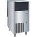 A large rectangular silver Manitowoc undercounter ice machine.