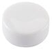 A white round plastic cap with a hole in the center.