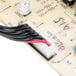A close-up of a Waring switch panel circuit board with a timer display.