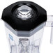 A clear container with a black lid for a Waring MMB blender.