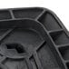 A black plastic Waring jar pad with a hole in it.