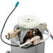 A close-up of a small Waring blender motor with wires.