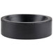 A black circular rubber pad with a hole in it.