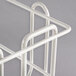 A white Metro can rack for #5 or #10 cans with two metal bars.