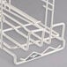 A white metal Metro can rack.