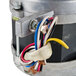 A Waring 024362 motor with wires attached to it.