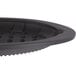 A black oval silicone underliner with a round edge and holes in it.