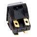 A black and gold Bunn momentary push button switch with two wires.