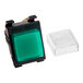 A square clear plastic cover with a green light on a black box.