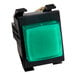 A green square light on a black device with black plastic holder.