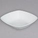 A white square bowl on a gray background.