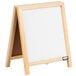 a white board with a brown background