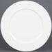 A CAC Majesty European bone china round plate with a small rim on a white background.