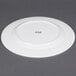 A CAC white European bone china round plate.