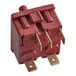 A red Bunn rotary switch with metal terminals.