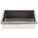A stainless steel Steril-Sil angled countertop silverware dispenser with a clear bottom.