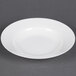 A CAC white bone china soup bowl with a rim.