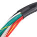 A close-up of a black and white cable with multiple colors.