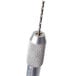 A close-up of a silver metal cleaning tool with a screw on it.
