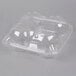 A clear plastic InnoPak muffin container with four compartments and a lid.