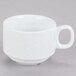 A CAC white porcelain coffee cup with a handle.