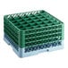 A full-size gray glass rack with 36 compartments and four green extenders for warewashing.