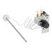 A white and silver thermostat assembly with a wire.