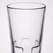 A clear Libbey stackable beverage glass with a square base.