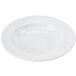 A close-up of a white bowl with a circular edge.