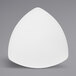A white triangular plate with a triangle shape on it.