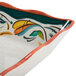 A GET Bella Fresco melamine tray with a colorful design on a table.