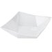 A close up of a CAC white square porcelain bowl with a curved edge.