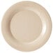 A white plate with speckled edges.