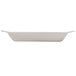 An ivory oval side dish with a handle.