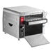 A silver rectangular Waring commercial conveyor toaster with a black handle.