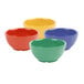 A close-up of a group of colorful bowls, including yellow, green, blue, and purple.