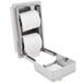A Bobrick multi roll recessed toilet paper dispenser with two rolls of toilet paper in metal holders.