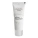 A white tube of Dial White Marble hand and body lotion with black text.