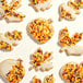 A frosted sugar cookie with Adourne Autumn Sprinkles.