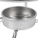 An American Metalcraft stainless steel stand holding a mini cast iron bowl.