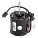 A black commercial refrigeration fan motor with wires attached.