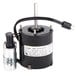 A black commercial refrigeration fan motor with a wire.
