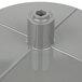 A close-up of a grey plastic Waring slinger disc with a screw hole.