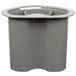 A large gray plastic pusher with a hole in the middle.