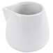 A close-up of a white porcelain creamer with a handle and lid.