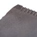 A close up of the black knife blade of a Larien Commercial Plus 5400 Bagel Biter Bagel Slicer.