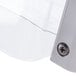 A close-up of a plastic container with a screw and a plastic cover for a Larien Commercial Plus 5400 Bagel Biter.